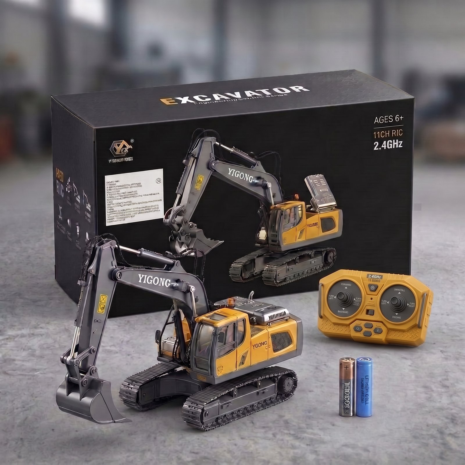 Excavadora RC con su caja, mando y baterías
